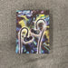 Noble Van Gogh earphone packaging on a textured surface