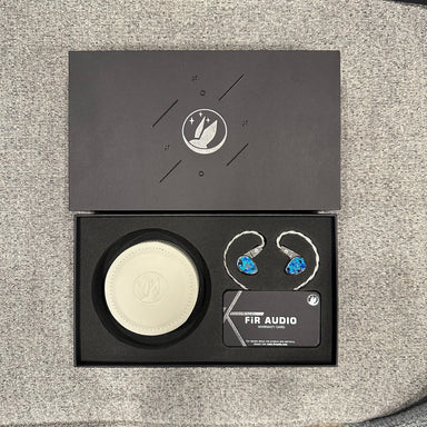 fir project k iems alongside full packaging materials, showing the iems and leather case