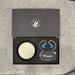 fir project k iems alongside full packaging materials, showing the iems and leather case