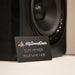 membership card leaning on a speaker