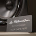 membership card leaning on a speaker and on a white table