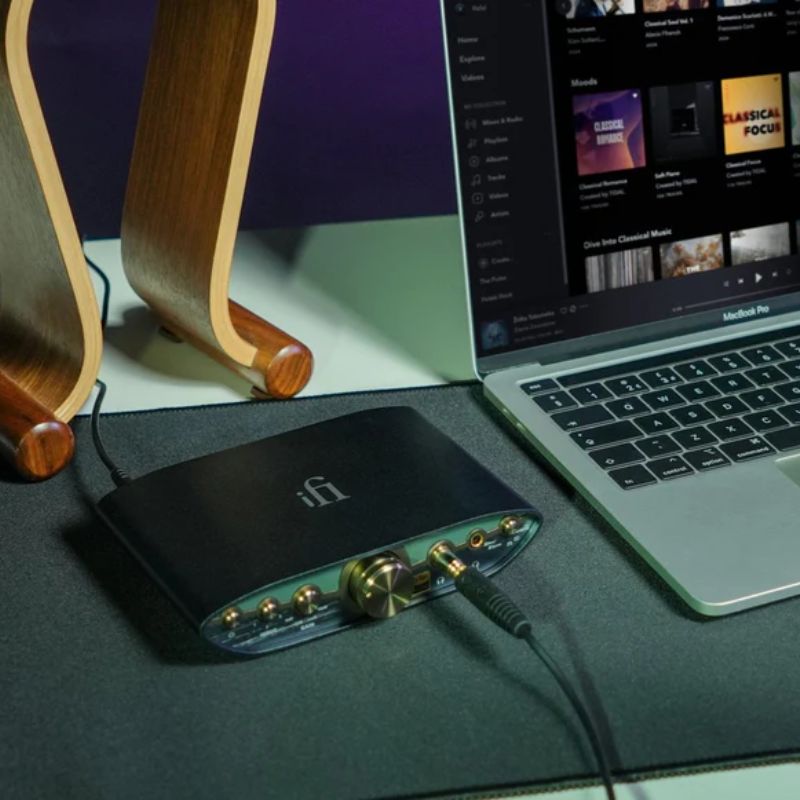 ifi audio zen can 3 next to a laptop