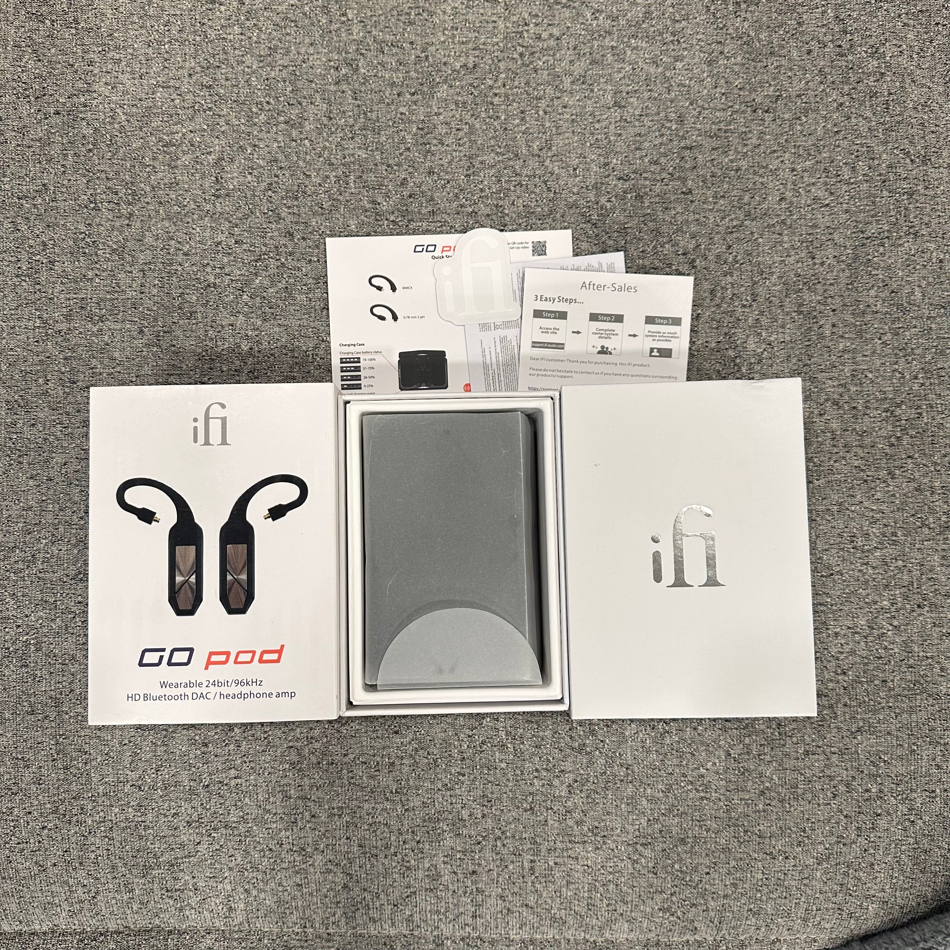 ifi audio Go Pod product packaging on a gray surface