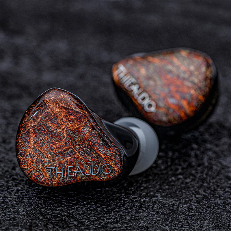 thieaudio mkii IEM view on black surface with ear tips
