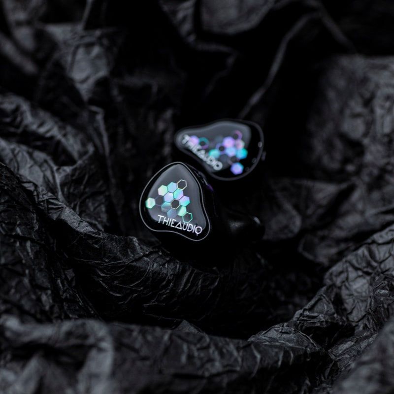 thieaudio monarch mkiv iem front shells view on black fabric